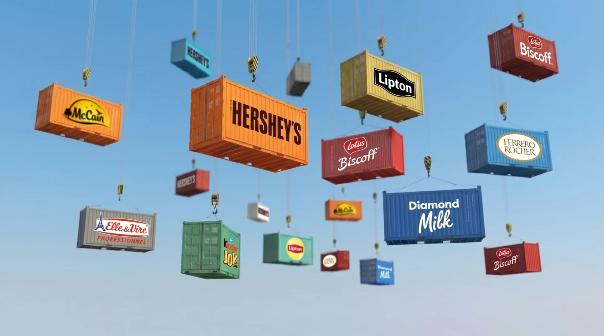Shipping containers branded Hershey's, McCain, Lipton, Ferrero Rocher and Diamond Milk hanging from cranes against a blue sky